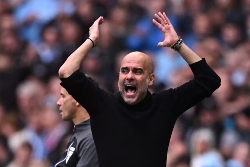 guardiola tempers fodens man city quadruple ambitions