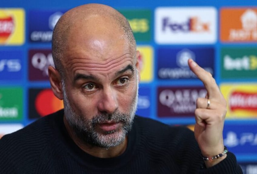 Manchester City manager Pep Guardiola speaks to the press ahead of his team's match agains