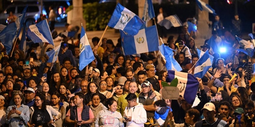 guatemalan presidential candidate wins in landslide but political elite could prevent him from taking office