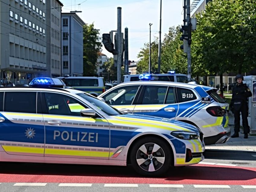 05 September 2024, Bavaria, Munich: Police officers are on duty in Munich with their vehic