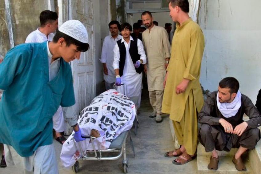 gunmen open fire on police officers during anti polio drive in southwest pakistan killing 2