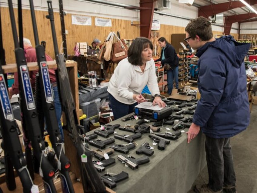 Wilderness Firearms, a licensed gun dealer selling new firearms at a gun show in Livingsto