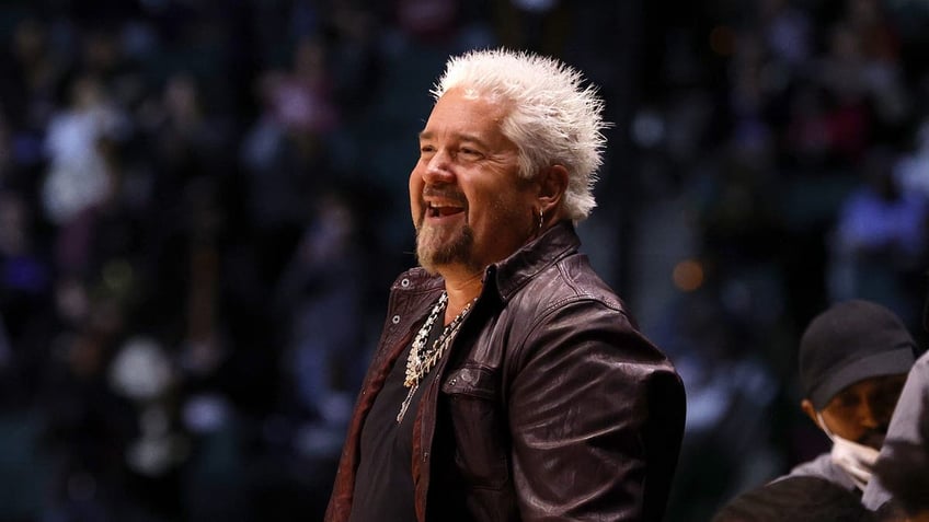 Guy Fieri at a basketball game