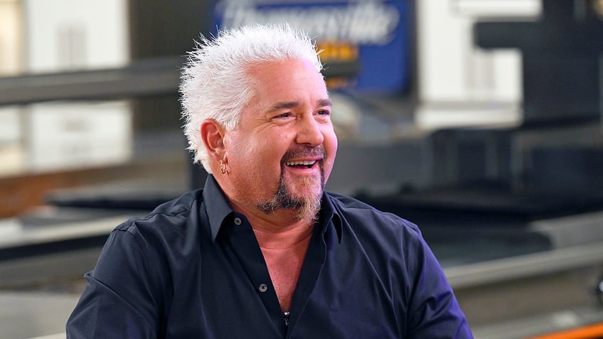 Guy Fieri laughing