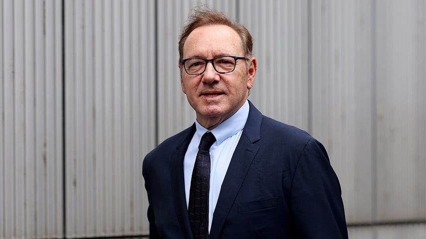 Kevin Spacey wearing glasses