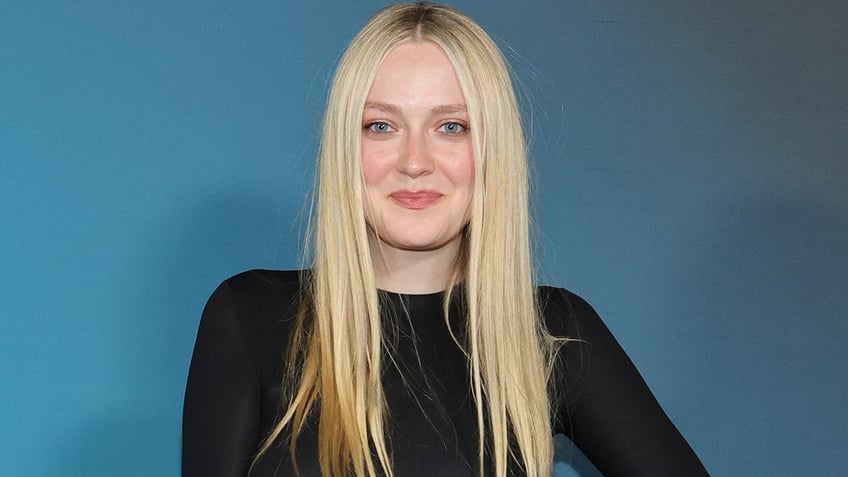 Dakota Fanning in a black dress