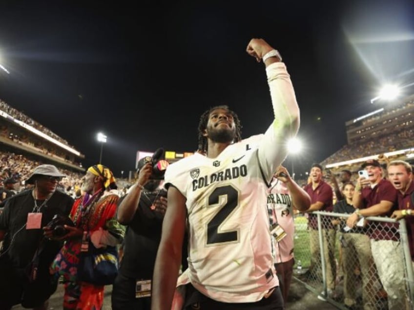 gwinn shedeur sanders taunts arizona state student section by flashing his gold watch after colorado win