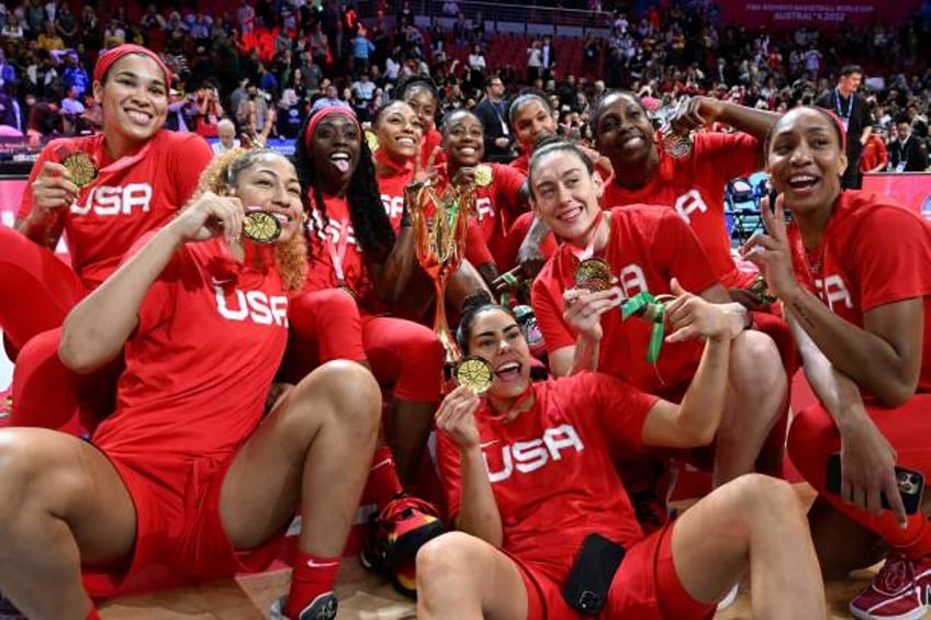 Team USA celebrate with their Gold medals of a trophy after the 2022 FIBA Women's Basketball World Cup final match between China and the USA at the...