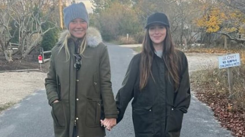 A photo of Gwyneth Paltrow and Dakota Johnson in matching jackets,