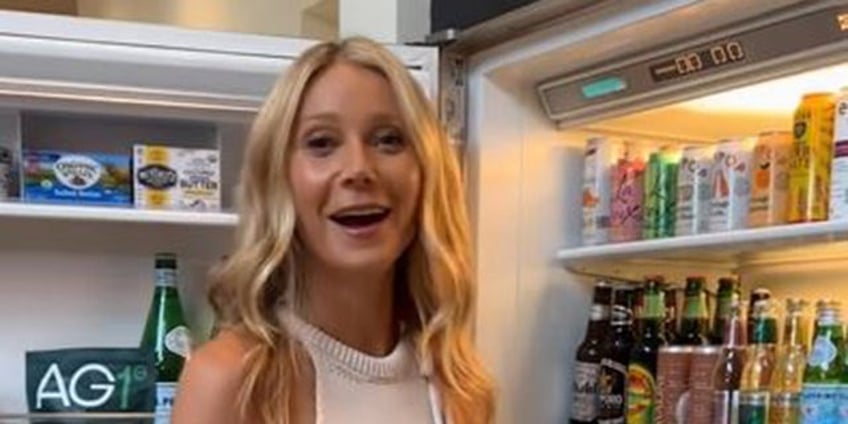 gwyneth paltrow who has been accused of promoting starvation diet shows lotions milk in fridge