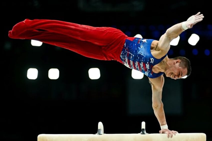 American Paul Juda competes on pommel horse in men's gymnastics qualifying at the Olympic