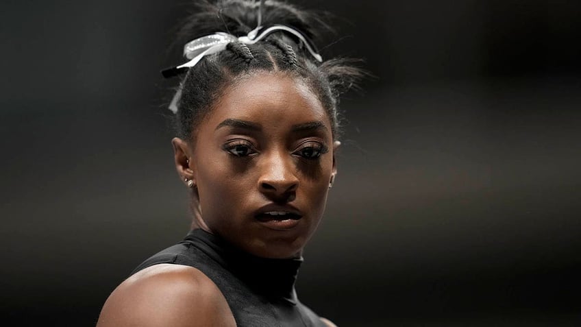 Simone Biles warms up