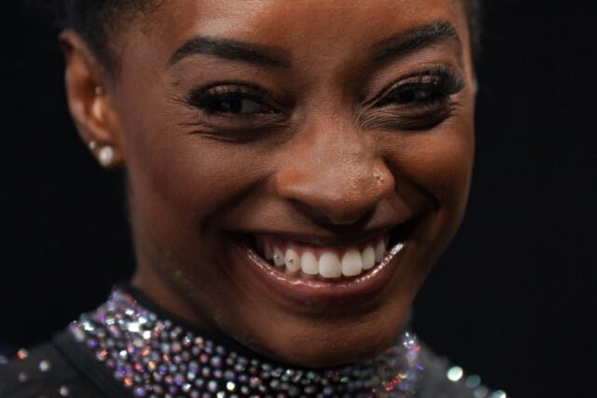 gymnastics queen biles returns to world stage in antwerp