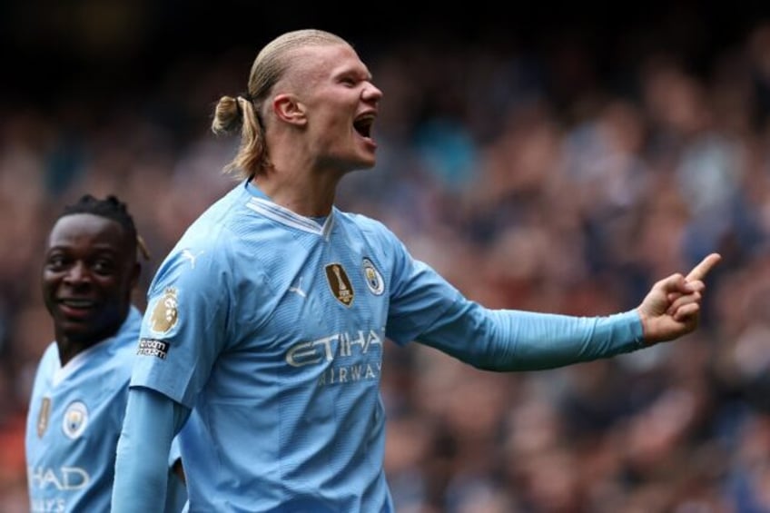 Manchester City striker Erling Haaland celebrates scoring against Everton