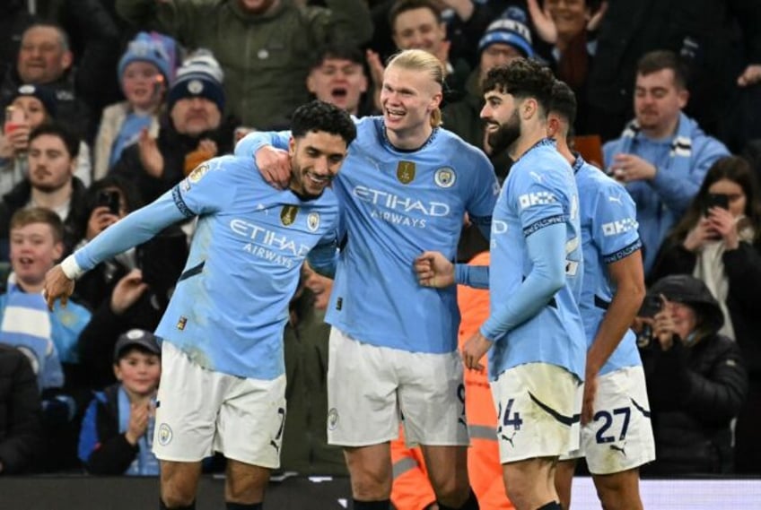 Erling Haaland (centre) was impressed by Omar Marmoush's (left)Man City debut