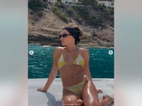Hailey Bieber rocks yellow bikini in summer photos ahead of Justin Bieber's reported album release