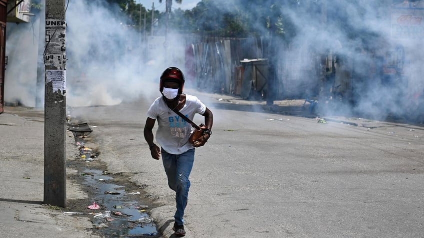 haiti police probe killings of parishioners who were led by pastor into gang territory