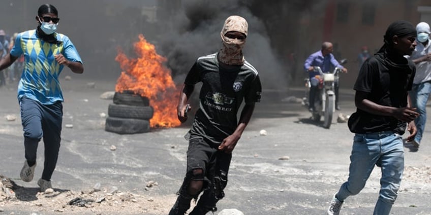 haitians march on port au prince by the thousands as gang violence fatigue boils over