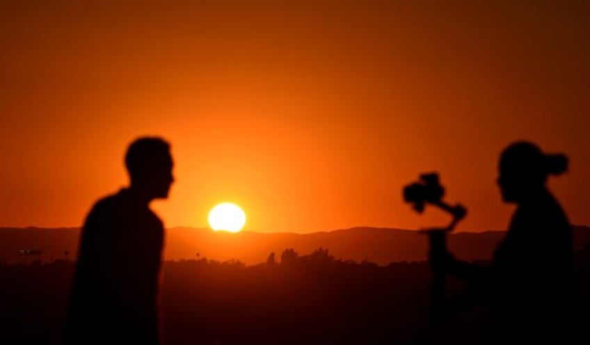 The sun sets on September 5, 2024 in Los Angeles, California, where temperatures hit 100F