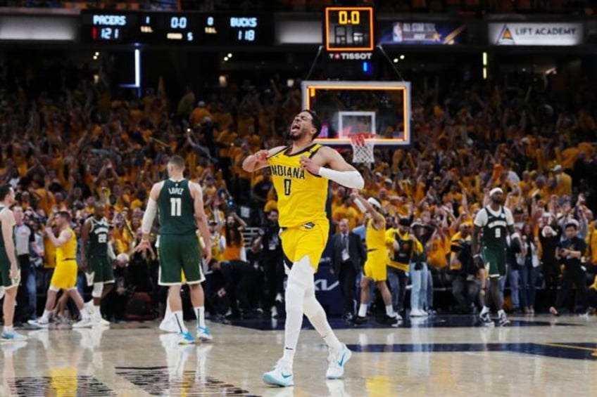 Indiana's Tyrese Haliburton celebrates after making the game-winner inthe Pacers' overtime