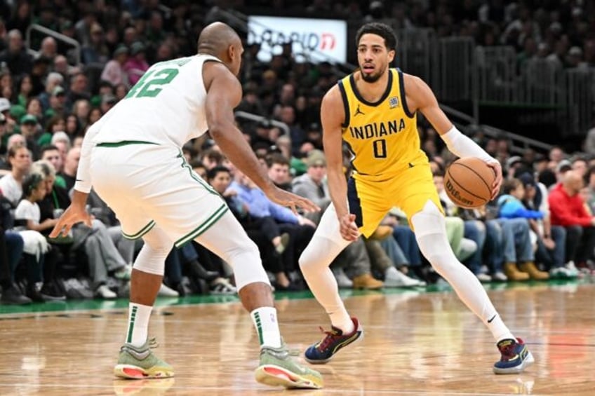 Indiana's Tyrese Haliburton drives against Al Horford in the Pacers' NBA victory over the