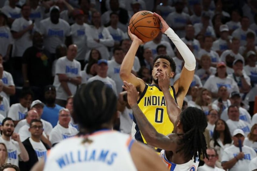 Indiana's Tyrese Haliburton shoots the winning basket with 0.3 of a second remaining to gi