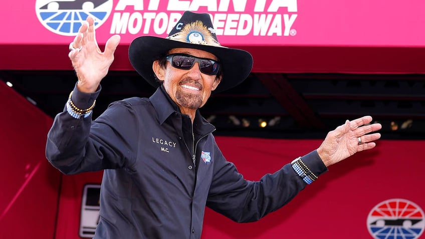 Richard Petty walks onstage 