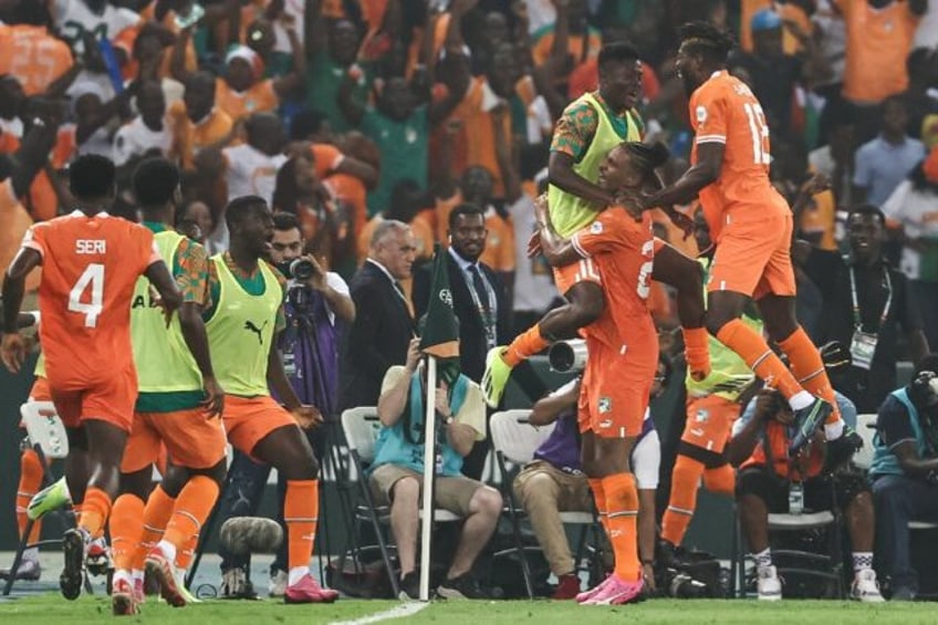 Sebastien Haller celebrates the goal that firec hosts Ivory Coast into Sunday's AFCON fina