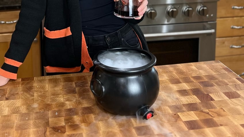 This is a closer look at the fog effect Mackenzie Biehl uses to add some spooky flare to her wine cauldron creation for Halloween.