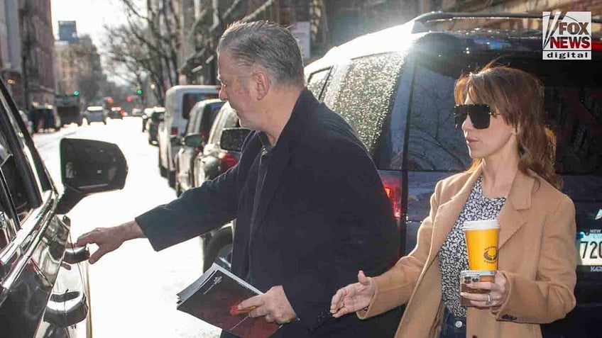 Alec Baldwin, who faces charges of involuntary manslaughter, gets into a car with wife, Hilaria Baldwin