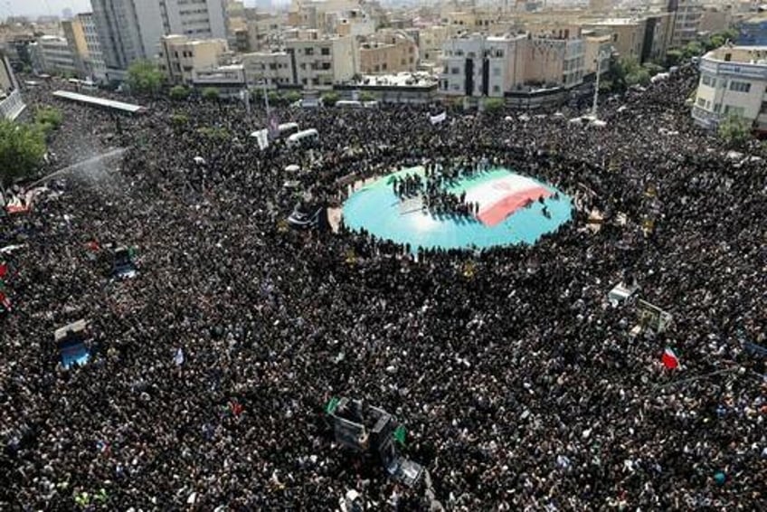 hamas leader attends raisis funeral in tehran overseen by ayatollah khamenei