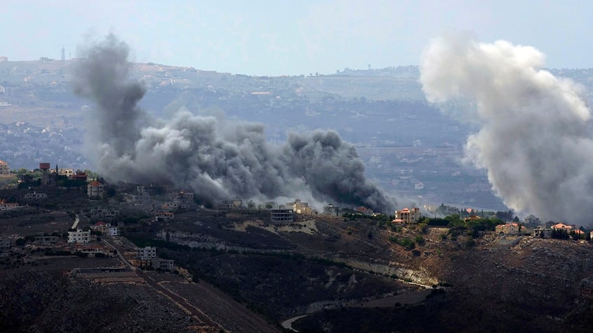 Smoke rises from Israeli airstrikes