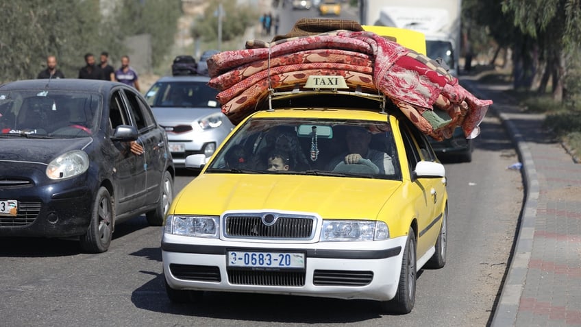 hamas preventing gaza residents from fleeing to safety palestinian activist says