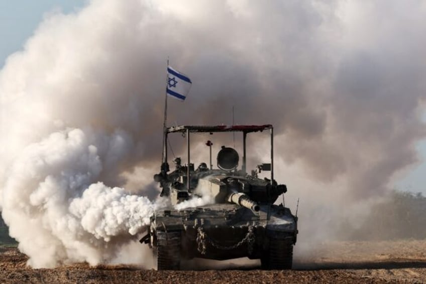 An Israeli army tank is seen in southern Israel along the border with the Gaza Strip