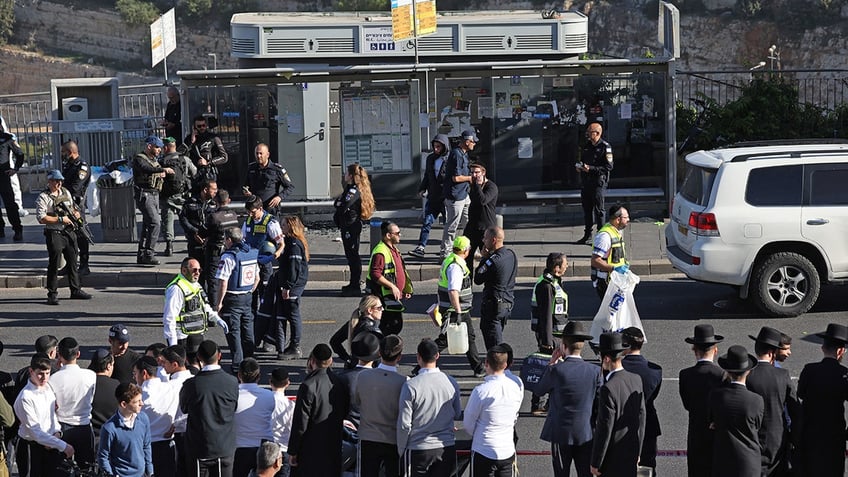 hamas terrorists open fire at bus stop near jerusalem leaving 3 dead 11 injured