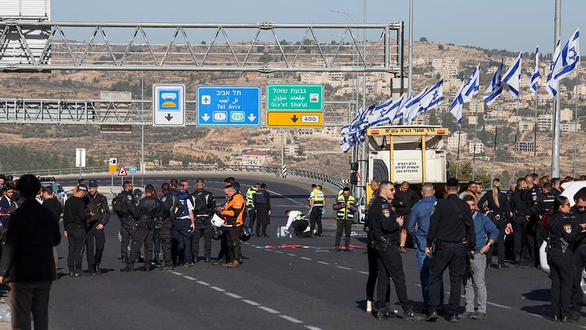 hamas terrorists open fire at bus stop near jerusalem leaving 3 dead 11 injured