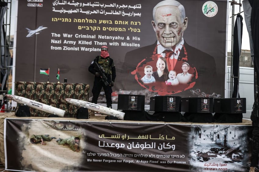 hamas terrorists return murdered israeli hostages in black coffins