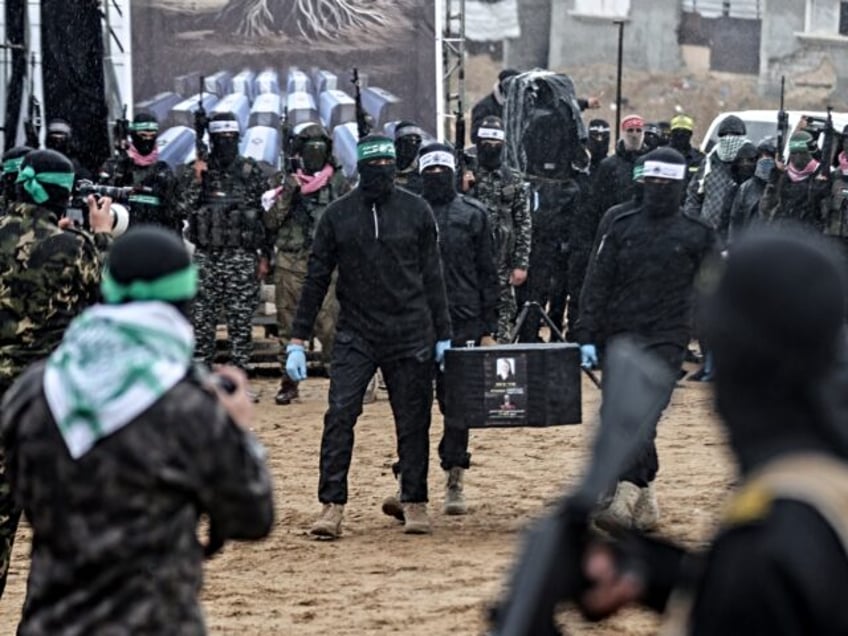 KHAN YUNIS, GAZA - FEBRUARY 20: Members of the Al-Qassam Brigades, the military wing of Ha