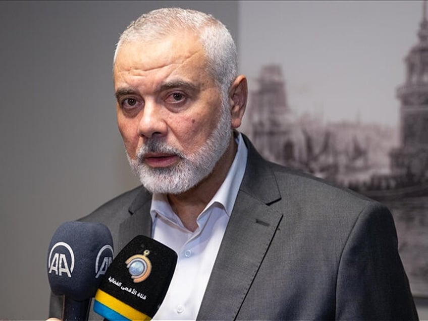 ISTANBUL, TURKIYE - SEPTEMBER 22: Chairman of the Hamas Political Bureau, Ismail Haniyeh speaks to press as he pays a visit to Palestinian photojournalist Ashraf Amra, a freelancer for Turkiye's premier news agency Anadolu who was severely injured on his hand by Israeli army fire while covering a protest demonstration, …