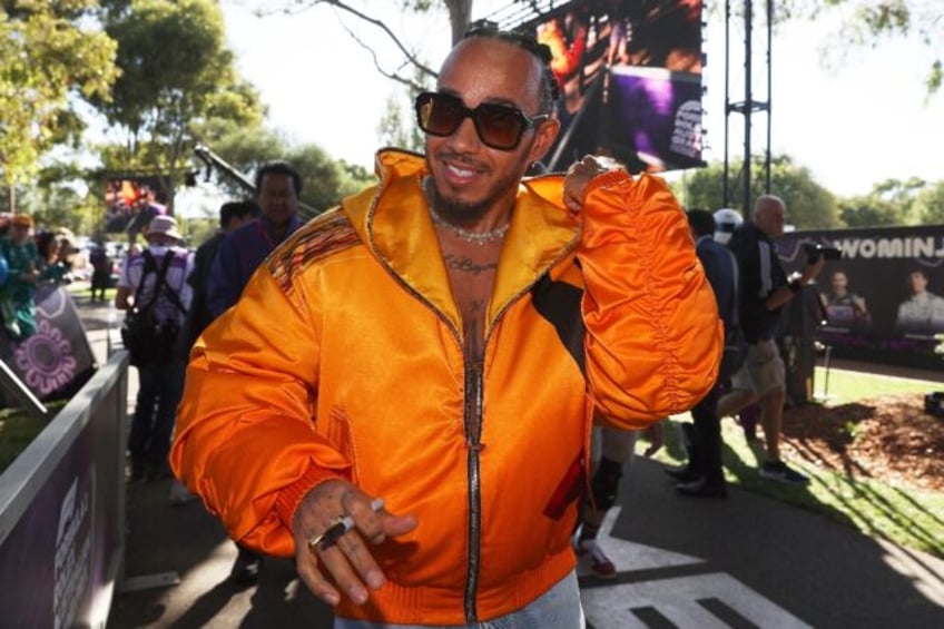 Mercedes' British driver Lewis Hamilton arrives at the Albert Park Circuit