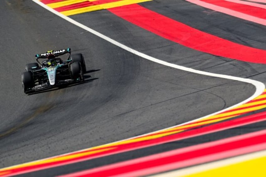 Mercedes' British driver Lewis Hamilton winning again