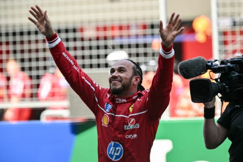 Lewis Hamilton celebrates winning the sprint race at Chinese Grand Prix