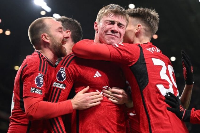 Manchester United's Rasmus Hojlund (C) celebrates after scoring against Aston Villa