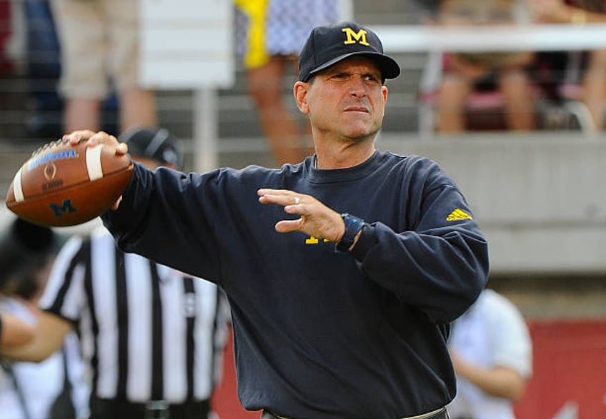 harbaugh to serve out suspension big ten ends michigan sign stealing investigation in settlement