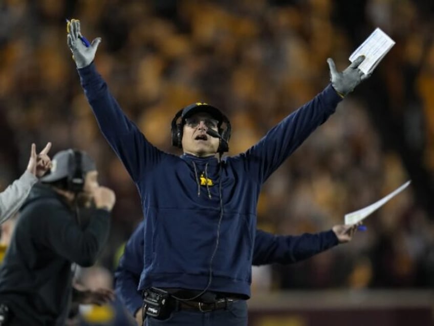 harbaugh to serve out suspension big ten ends michigan sign stealing investigation in settlement