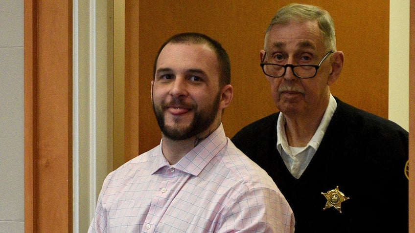 Adam Montgomery enters the courtroom for jury selection