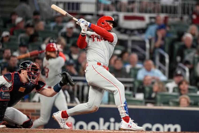 harper homers phillies shut down slugging braves 3 0 in game 1 of nlds