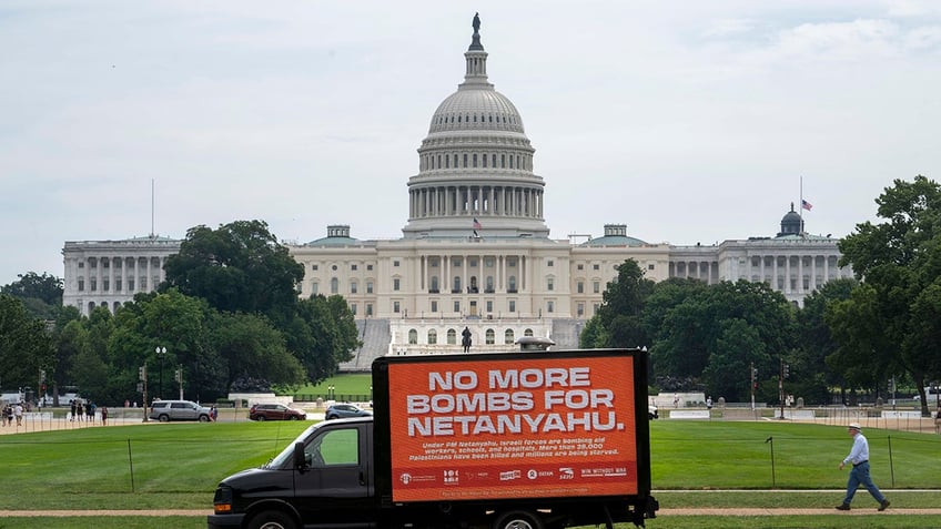 Netanyahu protest sign in DC