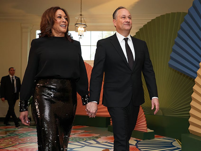 US Vice President Kamala Harris and Second Gentleman Doug Emhoff arrive at the White House