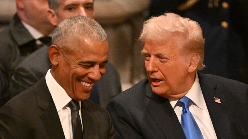 Obama laughing as Trump talks